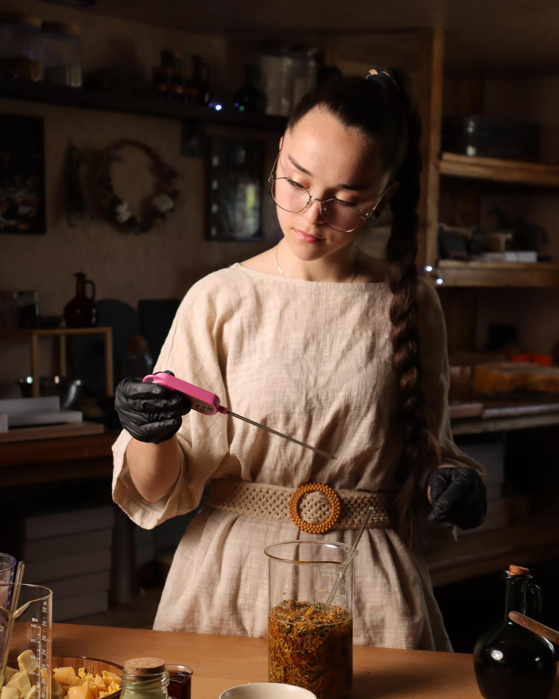 Nataliia at the workshop table — master maker behind NatureTouch Lab